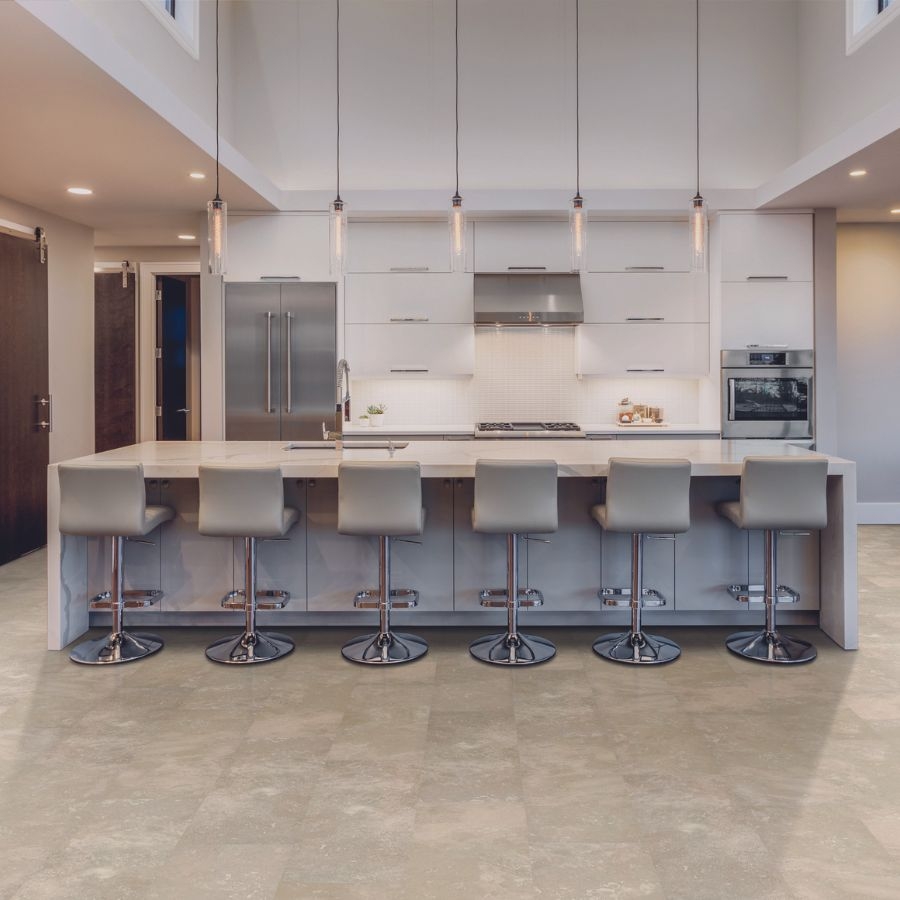 stone look tile flooring in kitchen area with kitchen island